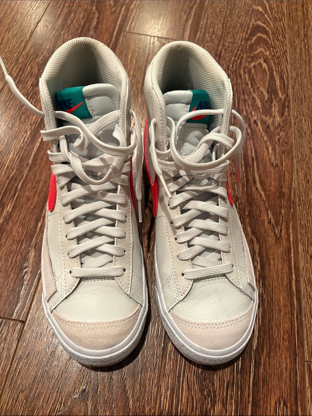 Nike Men’s White High-Top Sneakers with Red Swoosh and Teal Tongue